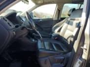 ✅ 2013 Volkswagen Tiguan S • VIN: WVGBV3AXXDW585174 • Lot: 93643875. Listed on Copart with 143,089 mi. Free auction sales archive from the USA and detailed vehicle history report at DreamBid. Image 7.