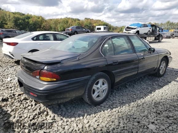 ✅ 1999 Pontiac Bonneville SE • VIN: 1G2HX52K4XH233440 • Лот: 85694595. Опубликован ранее на Copart с пробегом 96 250 миль. Бесплатный доступ к архиву аукционных продаж из США и подробный отчёт об истории автомобиля на DreamBid. Изображение 3.