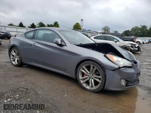 2010 Hyundai Genesis Coupe Track with VIN KMHHU6KH0AU031316, listed as a Copart auction lot 73744764 with 156,983 mi miles and Salvage title. Bid and sale history available at DreamBid. Image 4.