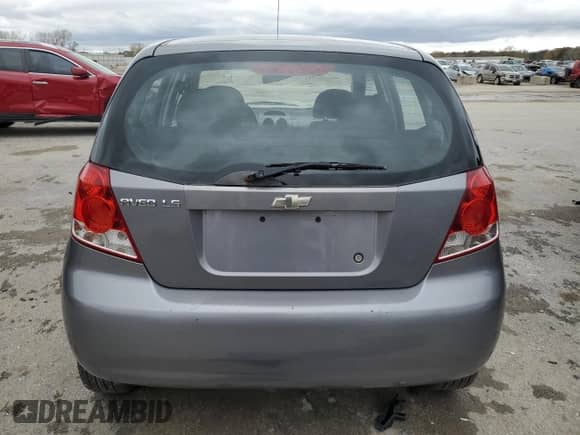 2006 Chevrolet Aveo LS with VIN KL1TD66666B674044, listed as a Copart auction lot 79207664 with 149,042 mi miles and Salvage title. Bid and sale history available at DreamBid. Image 6.