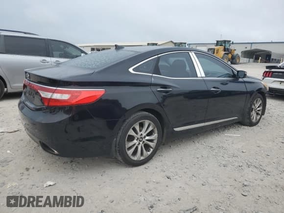 ✅ 2013 Hyundai Azera • VIN: KMHFG4JGXDA228608 • Лот: 69691545. Опубликован ранее на Copart с пробегом 194 323 миль. Бесплатный доступ к архиву аукционных продаж из США и подробный отчёт об истории автомобиля на DreamBid. Изображение 3.