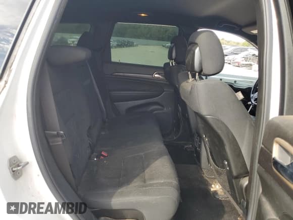 ✅ 2015 Jeep Grand Cherokee Laredo • VIN: 1C4RJEAG1FC669883 • Lot: 85857515. Listed on Copart with 228,860 mi. Free auction sales archive from the USA and detailed vehicle history report at DreamBid. Image 11.