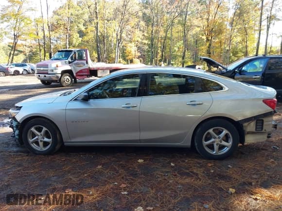 ✅ 2017 Chevrolet Malibu LS • VIN: 1G1ZB5STXHF194883 • Lot: 43582481. Listed on IAAI with 107,181 mi. Free auction sales archive from the USA and detailed vehicle history report at DreamBid. Image 14.