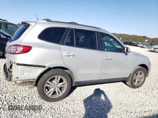 ✅ 2012 Hyundai Santa Fe SE • VIN: 5XYZHDAG2CG145428 • Lot: 81672604. Listed on Copart with 89,987 mi. Free auction sales archive from the USA and detailed vehicle history report at DreamBid. Image 3.