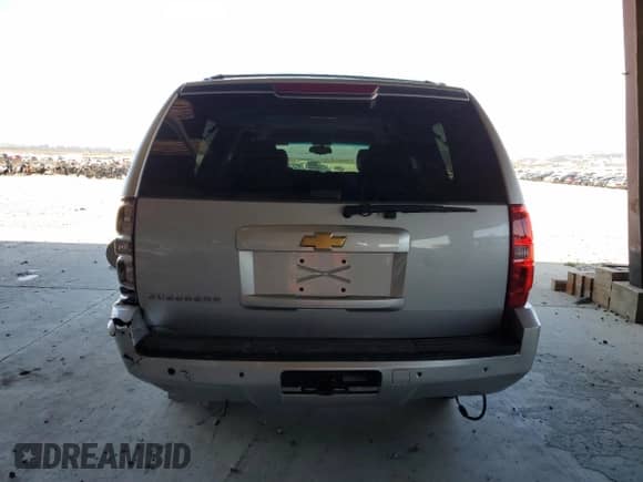 2013 Chevrolet Suburban LT with VIN 1GNSKJE79DR213312, listed as a Copart auction lot 70356745 with 79,474 mi miles and Salvage title. Bid and sale history available at DreamBid. Image 6.