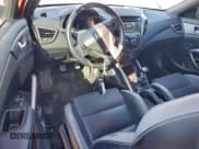 ✅ 2016 Hyundai Veloster Turbo Rally Edition • VIN: KMHTC6AEXGU289940 • Лот: 95263385. Опубликован ранее на Copart с пробегом 57 476 миль. Бесплатный доступ к архиву аукционных продаж из США и подробный отчёт об истории автомобиля на DreamBid. Изображение 8.