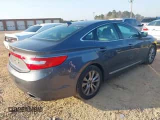 2013 Hyundai Azera z VIN KMHFG4JG6DA243655, wystawiony jako IAAI lot #41802097 z przebiegiem 135 677 mil mil oraz . Historia ofert i sprzedaży dostępna na DreamBid. Obrazek 4.