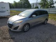 ✅ 2013 Mazda 5 Sport • VIN: JM1CW2BL5D0161531 • Lot: 65734385. Listed on Copart with 103,340 mi. Free auction sales archive from the USA and detailed vehicle history report at DreamBid. Image 1.