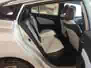 2021 Toyota Prius L Eco with VIN JTDKAMFU4M3147210, listed as a IAAI auction lot 42437023 with 12,673 mi miles and . Bid and sale history available at DreamBid. Image 8.