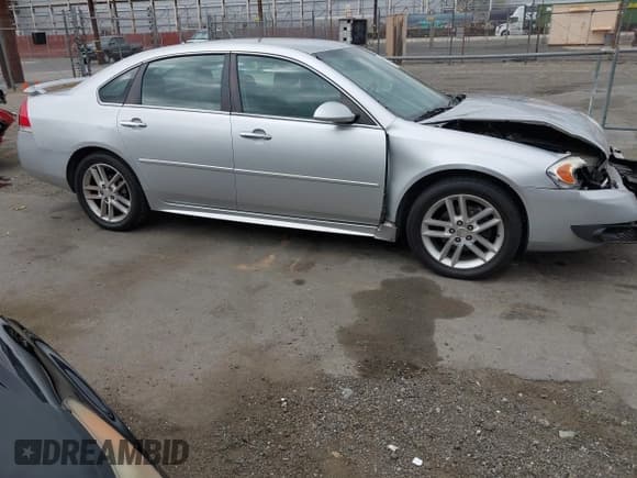 ✅ 2016 Chevrolet Impala LTZ • VIN: 2G1WC5E34G1132915 • Lot: 43325578. Listed on IAAI with 144,317 mi. Free auction sales archive from the USA and detailed vehicle history report at DreamBid. Image 12.