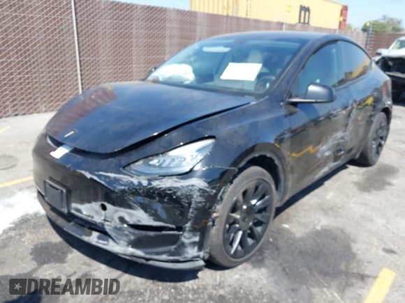 ✅ 2020 Tesla Model Y Long Range • VIN: 5YJYGDEE5LF046469 • Lot: 43230905. Listed on IAAI with 77,740 mi. Free auction sales archive from the USA and detailed vehicle history report at DreamBid. Image 2.