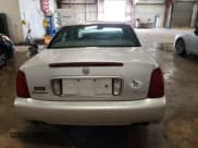 ✅ 2000 Cadillac DeVille • VIN: 1G6KF5793YU252454 • Lot: 56850575. Listed on Copart with 127,388 mi. Free auction sales archive from the USA and detailed vehicle history report at DreamBid. Image 6.