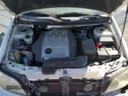 ✅ 2002 Kia Sedona LX • VIN: KNDUP131126201882 • Lot: 69361814. Listed on Copart with Not provided. Free auction sales archive from the USA and detailed vehicle history report at DreamBid. Image 12.