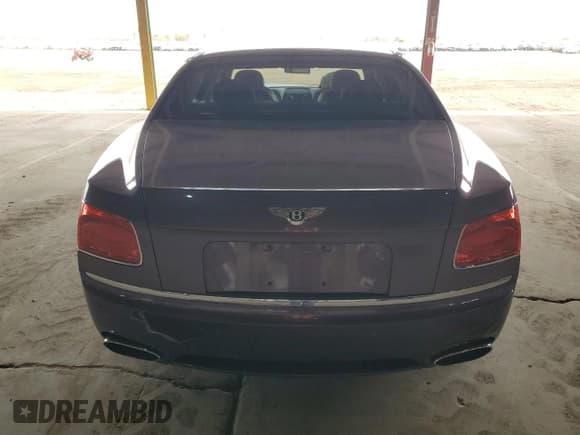 ✅ 2014 Bentley Flying Spur • VIN: SCBEC9ZA7EC094304 • Lot: 39112234. Wystawiony na Copart z przebiegiem 60 884 mil. Bezpłatny archiwum sprzedaży aukcyjnych z USA i szczegółowy raport historii pojazdu na DreamBid. Zdjęcie 6.