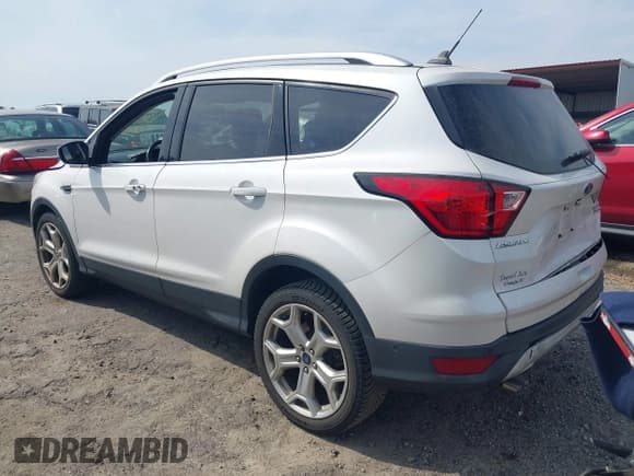 ✅ 2019 Ford Escape Titanium • VIN: 1FMCU0J99KUB62389 • Lot: 41792898. Listed on IAAI with 91,534 mi. Free auction sales archive from the USA and detailed vehicle history report at DreamBid. Image 3.