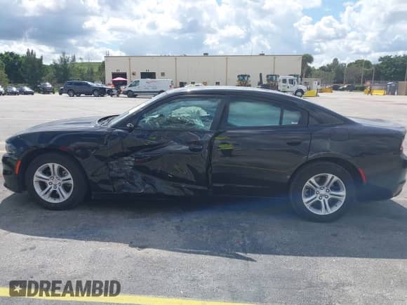 2023 Dodge Charger SXT z VIN 2C3CDXBG8PH551730, wystawiony jako IAAI lot #43507351 z przebiegiem 52 150 mil mil oraz . Historia ofert i sprzedaży dostępna na DreamBid. Obrazek 15.