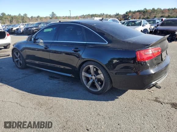 ✅ 2014 Audi S6 Prestige • VIN: WAUF2AFC3EN007849 • Лот: 80136634. Опубликован ранее на Copart с пробегом 128 799 миль. Бесплатный доступ к архиву аукционных продаж из США и подробный отчёт об истории автомобиля на DreamBid. Изображение 2.