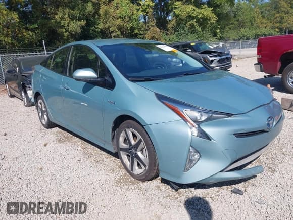 ✅ 2016 Toyota Prius Four • VIN: JTDKARFU4G3004551 • Lot: 43214616. Listed on IAAI with 185,688 mi. Free auction sales archive from the USA and detailed vehicle history report at DreamBid. Image 1.