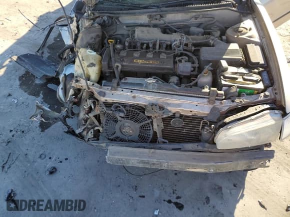 ✅ 1994 Geo Prizm • VIN: 1Y1SK5362RZ083578 • Lot: 77146684. Listed on Copart with 231,625 mi. Free auction sales archive from the USA and detailed vehicle history report at DreamBid. Image 12.