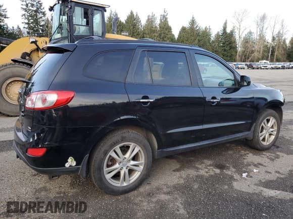 ✅ 2012 Hyundai Santa Fe Limited • VIN: 5XYZKDAG4CG163883 • Lot: 88688995. Listed on Copart with 82,116 mi. Free auction sales archive from the USA and detailed vehicle history report at DreamBid. Image 3.
