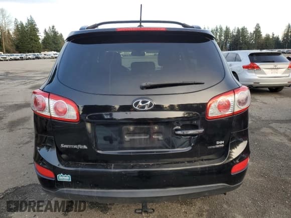 ✅ 2012 Hyundai Santa Fe Limited • VIN: 5XYZKDAG4CG163883 • Lot: 88688995. Listed on Copart with 82,116 mi. Free auction sales archive from the USA and detailed vehicle history report at DreamBid. Image 6.