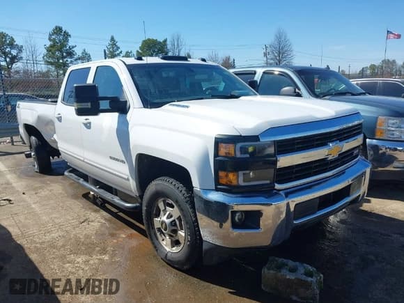 ✅ 2015 Chevrolet Silverado 2500HD LT • VIN: 1GC1KVE86FF520235 • Lot: 41664064. Listed on IAAI with 235,288 mi. Free auction sales archive from the USA and detailed vehicle history report at DreamBid. Image 1.