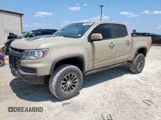✅ 2022 Chevrolet Colorado 4WD ZR2 • VIN: 1GCGTEEN4N1297962 • Лот: 68180315. Опубликован ранее на Copart с пробегом 57 073 миль. Бесплатный доступ к архиву аукционных продаж из США и подробный отчёт об истории автомобиля на DreamBid. Изображение 1.
