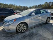 ✅ 2013 Hyundai Sonata SE • VIN: 5NPEC4AC2DH809862 • Lot: 87446355. Listed on Copart with 104,027 mi. Free auction sales archive from the USA and detailed vehicle history report at DreamBid. Image 1.