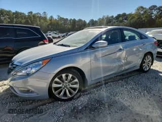 ✅ 2013 Hyundai Sonata SE • VIN: 5NPEC4AC2DH809862 • Lot: 87446355. Listed on Copart with 104,027 mi. Free auction sales archive from the USA and detailed vehicle history report at DreamBid. Image 1.