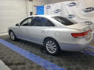 2007 Hyundai Azera SE с VIN KMHFC46F67A239170, выставлен на аукционе Copart как лот 63229605 с пробегом 182 044 миль миль и Чистый • Clean title. История ставок и продаж доступна на DreamBid. Изображение 2.