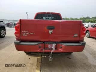2007 Dodge Dakota SLT с VIN 1D7HW42P07S124311, выставлен на аукционе Copart как лот 64675114 с пробегом 145 567 миль миль и На запчасти • Non repairable. История ставок и продаж доступна на DreamBid. Изображение 6.