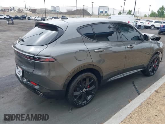 ✅ 2024 Dodge Hornet R/T • VIN: ZACPDFCW9R3A18890 • Lot: 42754647. Listed on IAAI with 4,015 mi. Free auction sales archive from the USA and detailed vehicle history report at DreamBid. Image 4.