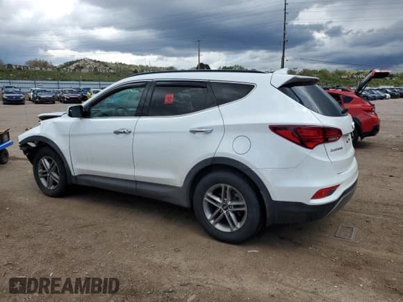 ✅ 2018 Hyundai Santa Fe 2.4L • VIN: 5NMZUDLB7JH065557 • Лот: 54971454. Опубликован ранее на Copart с пробегом Не указан. Бесплатный доступ к архиву аукционных продаж из США и подробный отчёт об истории автомобиля на DreamBid. Изображение 2.
