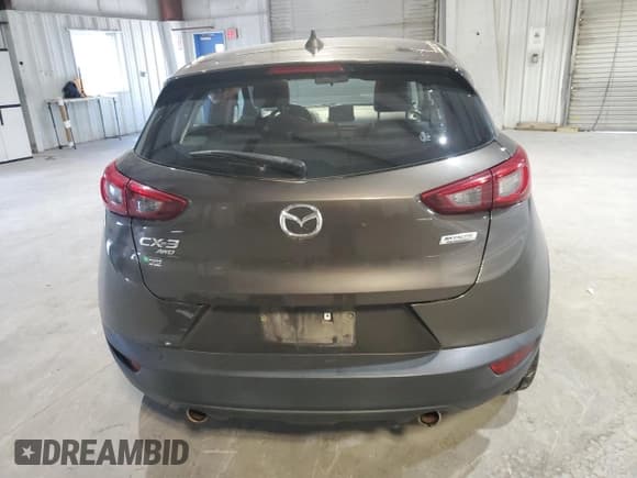 ✅ 2018 Mazda CX-3 Touring • VIN: JM1DKFC70J0321383 • Lot: 71550735. Wystawiony na Copart z przebiegiem 68 196 mil. Bezpłatny archiwum sprzedaży aukcyjnych z USA i szczegółowy raport historii pojazdu na DreamBid. Zdjęcie 6.
