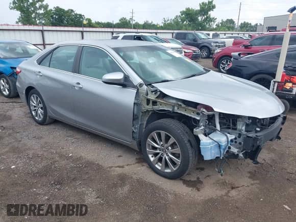 2015 Toyota Camry LE with VIN 4T1BD1FK2FU168750, listed as a IAAI auction lot 42676958 with 128,327 mi miles and . Bid and sale history available at DreamBid. Image 1.
