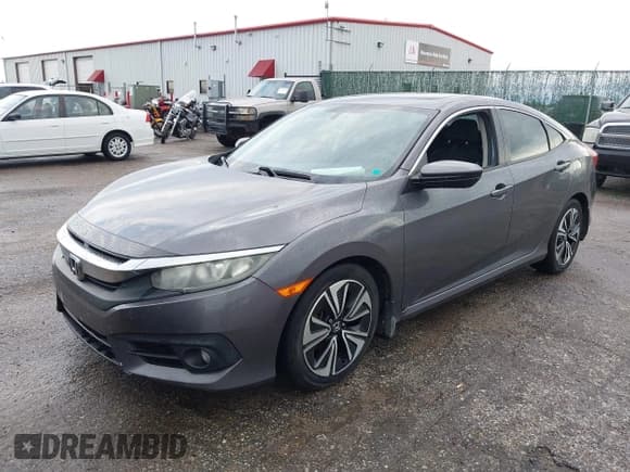 ✅ 2016 Honda Civic EX-T • VIN: 19XFC1F3XGE004308 • Lot: 43245523. Wystawiony na IAAI z przebiegiem 176 600 mil. Bezpłatny archiwum sprzedaży aukcyjnych z USA i szczegółowy raport historii pojazdu na DreamBid. Zdjęcie 2.