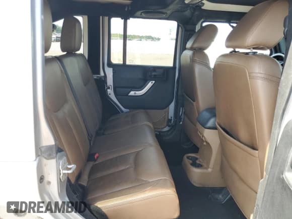 ✅ 2014 Jeep Wrangler Unlimited Sahara • VIN: 1C4BJWEG9EL108847 • Lot: 70563165. Wystawiony na Copart z przebiegiem 172 316 mil. Bezpłatny archiwum sprzedaży aukcyjnych z USA i szczegółowy raport historii pojazdu na DreamBid. Zdjęcie 11.