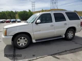 ✅ 2003 Cadillac Escalade • VIN: 1GYEC63T53R114544 • Lot: 64882375. Wystawiony na Copart z przebiegiem 242 839 mil. Bezpłatny archiwum sprzedaży aukcyjnych z USA i szczegółowy raport historii pojazdu na DreamBid. Zdjęcie 1.