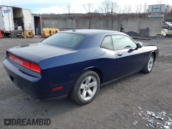 ✅ 2013 Dodge Challenger SXT • VIN: 2C3CDYAG8DH591020 • Lot: 43811585. Listed on IAAI with 120,596 mi. Free auction sales archive from the USA and detailed vehicle history report at DreamBid. Image 4.