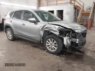 ✅ 2014 Mazda CX-5 Touring • VIN: JM3KE2CY0E0311997 • Lot: 43584794. Wystawiony na IAAI z przebiegiem 213 266 mil. Bezpłatny archiwum sprzedaży aukcyjnych z USA i szczegółowy raport historii pojazdu na DreamBid. Zdjęcie 1.