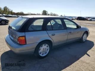 ✅ 1997 Saturn SW • VIN: 1G8ZK8274VZ194085 • Лот: 50230135. Опубликован ранее на Copart с пробегом 211 051 миль. Бесплатный доступ к архиву аукционных продаж из США и подробный отчёт об истории автомобиля на DreamBid. Изображение 3.