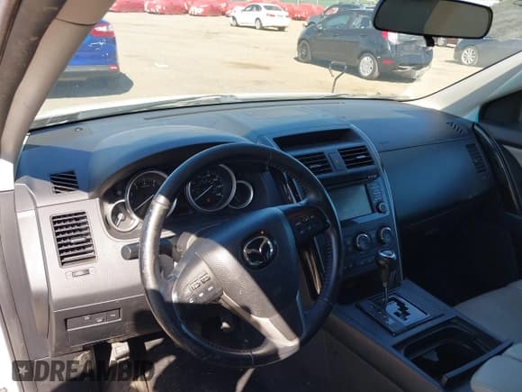 ✅ 2015 Mazda CX-9 Touring • VIN: JM3TB3CV1F0461403 • Lot: 42148325. Listed on IAAI with 143,452 mi. Free auction sales archive from the USA and detailed vehicle history report at DreamBid. Image 17.