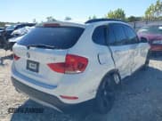 ✅ 2015 BMW X1 sDrive28i • VIN: WBAVM1C57FVW57653 • Lot: 43516277. Listed on IAAI with 113,430 mi. Free auction sales archive from the USA and detailed vehicle history report at DreamBid. Image 4.