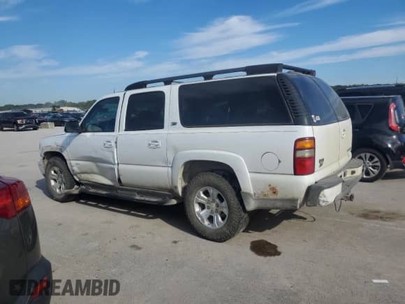 2002 Chevrolet Suburban Z71 с VIN 3GNFK16Z12G270537, выставлен на аукционе Copart как лот 69942434 с пробегом 230 581 миль миль и Списание • Salvage title. История ставок и продаж доступна на DreamBid. Изображение 2.