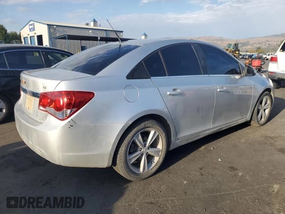 ✅ 2014 Chevrolet Cruze 2LT • VIN: 1G1PE5SB0E7335682 • Lot: 82730995. Listed on Copart with 136,256 mi. Free auction sales archive from the USA and detailed vehicle history report at DreamBid. Image 3.