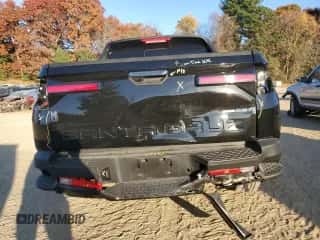 2024 Hyundai Santa Cruz Night Edition z VIN 5NTJCDAF1RH097751, wystawiony jako Copart lot #76019754 z przebiegiem 14 967 mil mil oraz Szkoda całkowita • Salvage title. Historia ofert i sprzedaży dostępna na DreamBid. Obrazek 6.