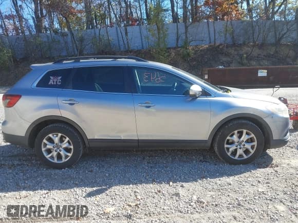 ✅ 2014 Mazda CX-9 Touring • VIN: JM3TB3CV9E0444394 • Lot: 43545643. Wystawiony na IAAI z przebiegiem 157 070 mil. Bezpłatny archiwum sprzedaży aukcyjnych z USA i szczegółowy raport historii pojazdu na DreamBid. Zdjęcie 13.