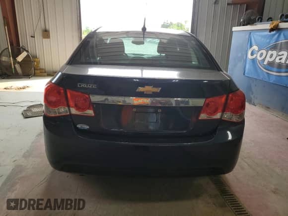 ✅ 2014 Chevrolet Cruze LS • VIN: 1G1PA5SH5E7246125 • Lot: 63981185. Wystawiony na Copart z przebiegiem 100 065 mil mil. Skorzystaj z bezpłatnego archiwum sprzedaży aukcyjnych z USA i zobacz szczegółowy raport historii pojazdu na DreamBid. Zdjęcie 6.