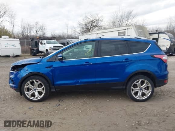 ✅ 2018 Ford Escape Titanium • VIN: 1FMCU9J91JUA12747 • Lot: 43732056. Listed on IAAI with 114,802 mi. Free auction sales archive from the USA and detailed vehicle history report at DreamBid. Image 15.