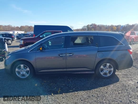 ✅ 2012 Honda Odyssey Touring • VIN: 5FNRL5H96CB103962 • Lot: 43587214. Listed on IAAI with 169,916 mi. Free auction sales archive from the USA and detailed vehicle history report at DreamBid. Image 14.